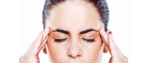 Behandlung von Kopfschmerzen, Tinnitus, Nackenschmerzen und Knacken im Kiefergelenk